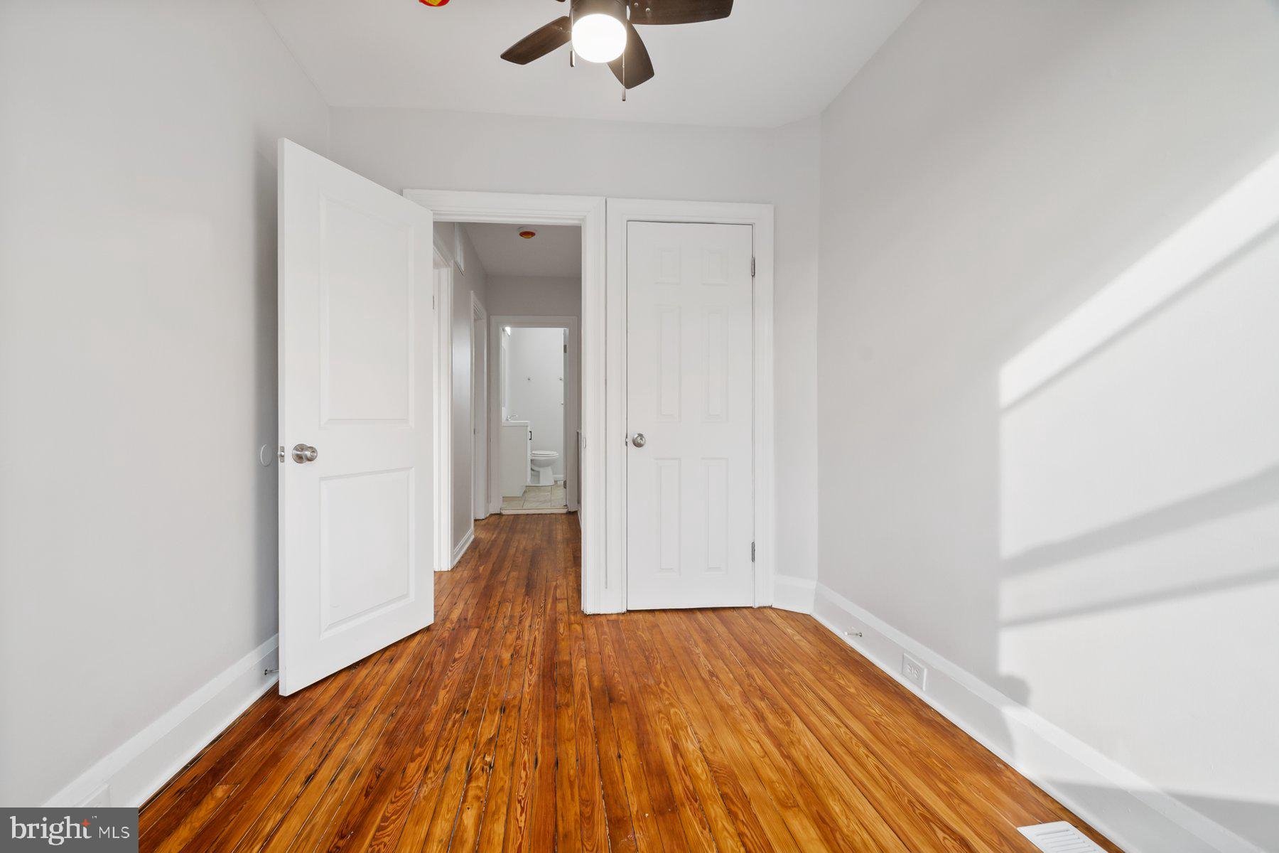 101 Willow Spring Road Dundalk, MD 21222 - Photo 21 of 28 a view of empty room with wooden floor