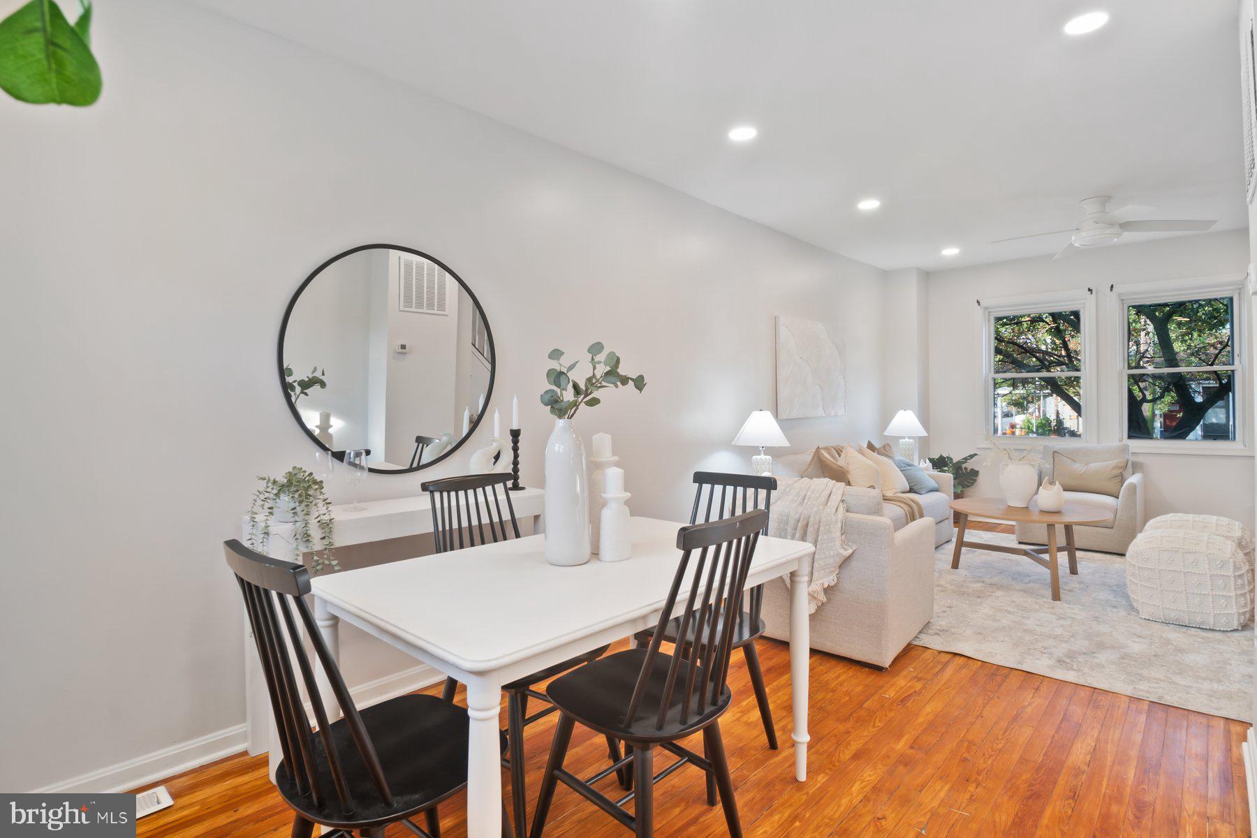 101 Willow Spring Road Dundalk, MD 21222 - Photo 8 of 28 a view of a dining room with furniture and a large window