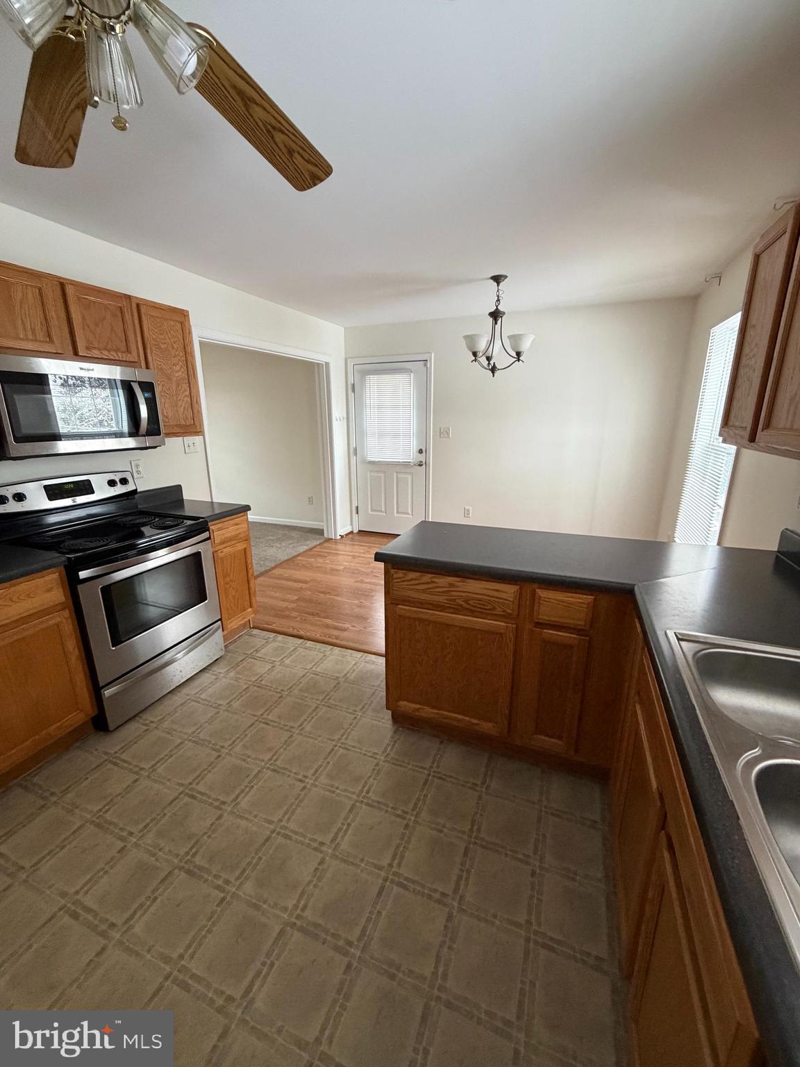 1914 Fairfax Road Annapolis, MD 21401 - Photo 3 of 10 a kitchen with stainless steel appliances cabinets and a sink