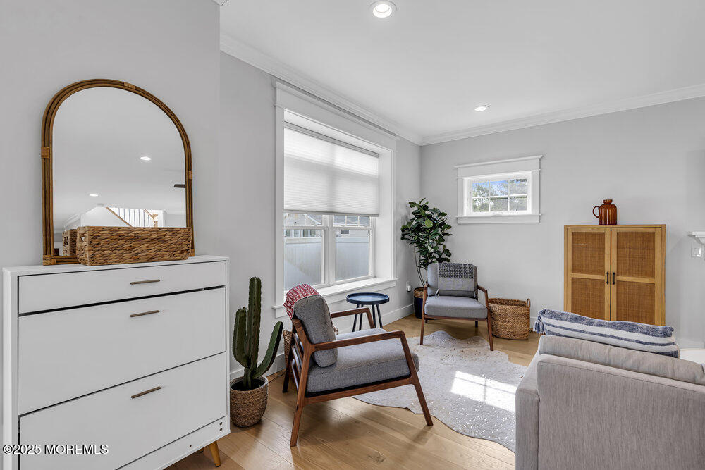 601 Ocean Road Spring Lake Heights, NJ 07762 - Photo 12 of 41 a living room with furniture and a window