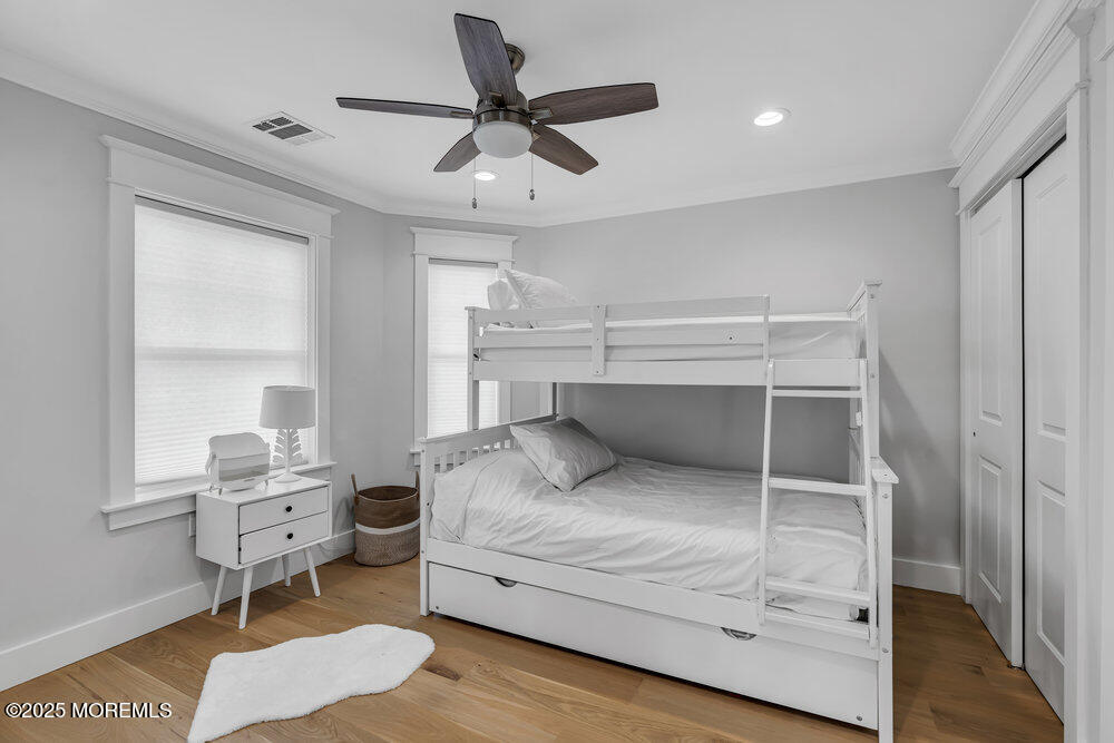 601 Ocean Road Spring Lake Heights, NJ 07762 - Photo 20 of 41 a bedroom with a bed and a window