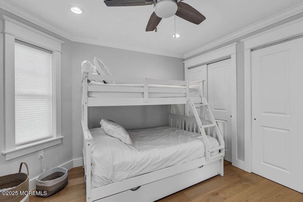 601 Ocean Road Spring Lake Heights, NJ 07762 - Photo 21 of 41 a bedroom with a bed and a window