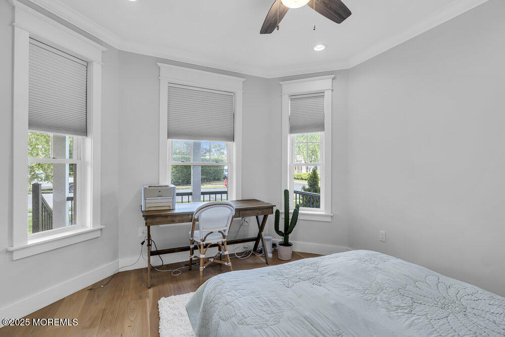 601 Ocean Road Spring Lake Heights, NJ 07762 - Photo 25 of 41 a living room with furniture and a window