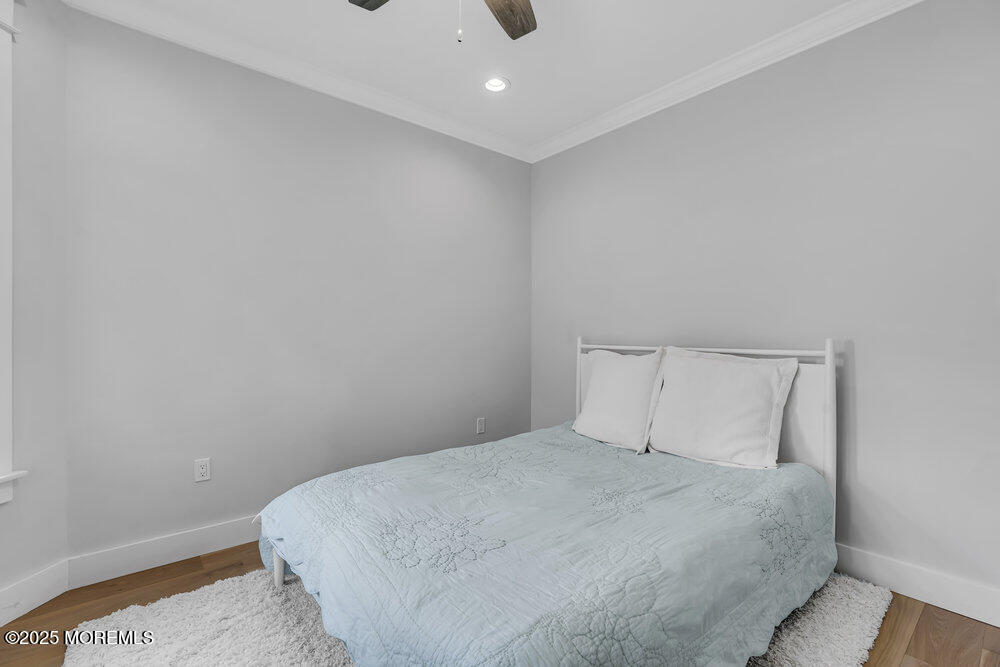 601 Ocean Road Spring Lake Heights, NJ 07762 - Photo 26 of 41 a bedroom with a bed