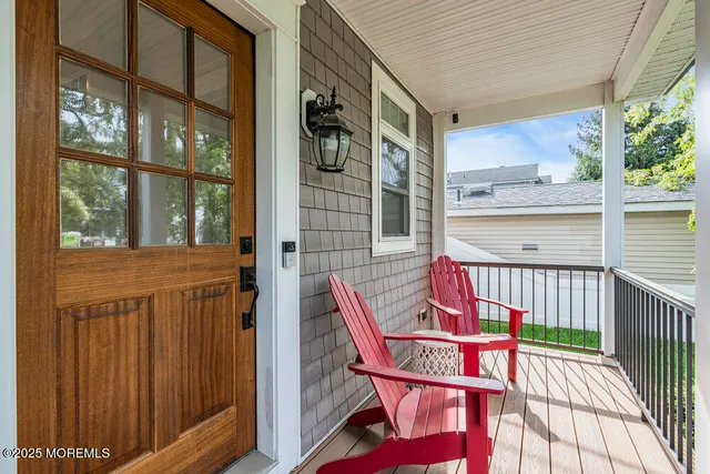 a view of an chairs and table in the balcony