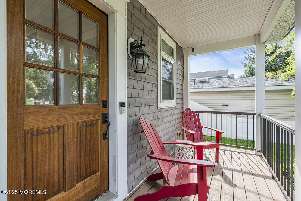 601 Ocean Road Spring Lake Heights, NJ 07762 - Photo 30 of 41 a view of an chairs and table in the balcony