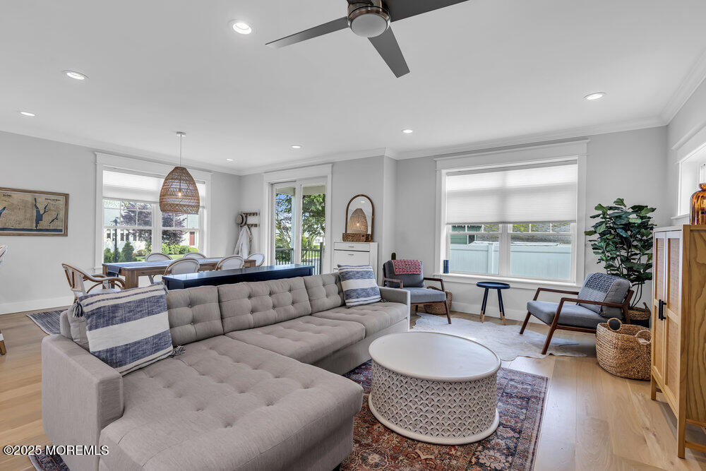 601 Ocean Road Spring Lake Heights, NJ 07762 - Photo 10 of 41 a living room with furniture and a large window
