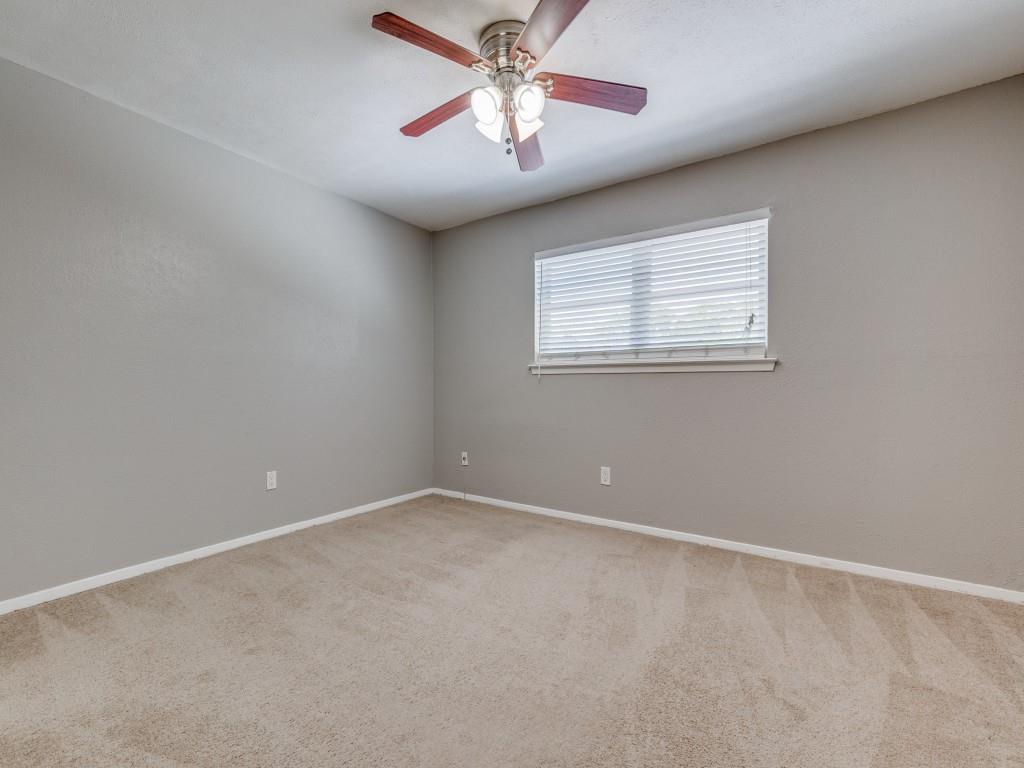 3921 Inwood Road, Unit 2015 Dallas, TX 75209 - Photo 9 of 12 Spare room featuring light carpet and a ceiling fan