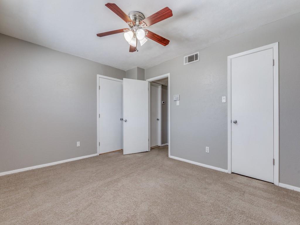 3921 Inwood Road, Unit 2015 Dallas, TX 75209 - Photo 10 of 12 Unfurnished bedroom featuring light colored carpet and a ceiling fan