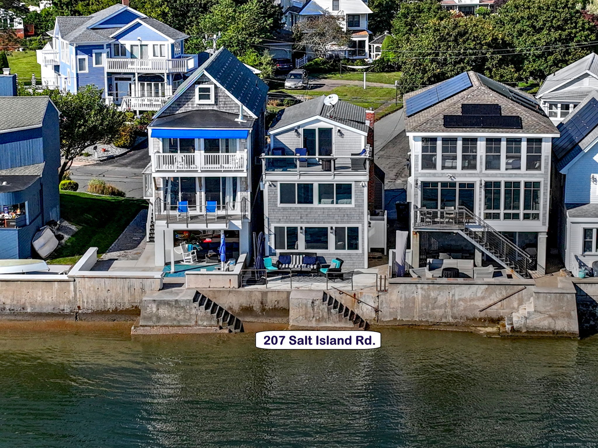 a house with river in front of it