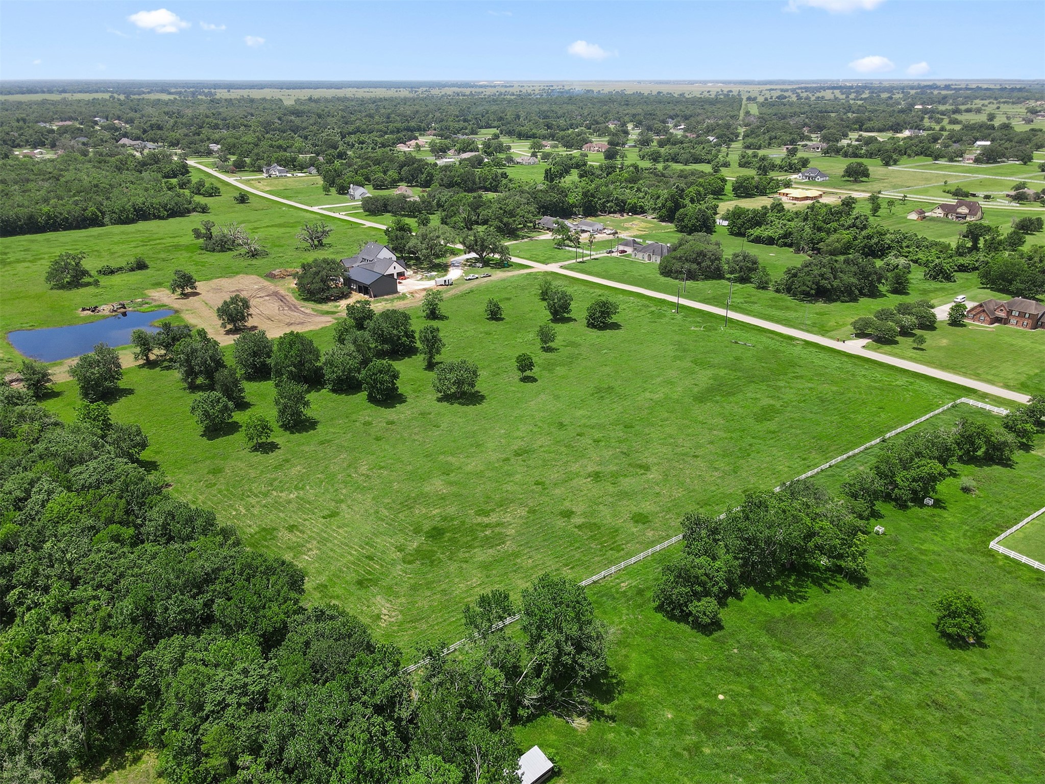 16403 Sun Valley Lane Rosharon, TX 77583 - Photo 1 of 15 a view of a green field with lots of green space