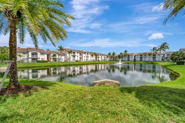 a view of a lake with a houses