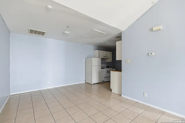 a view of a kitchen with a sink