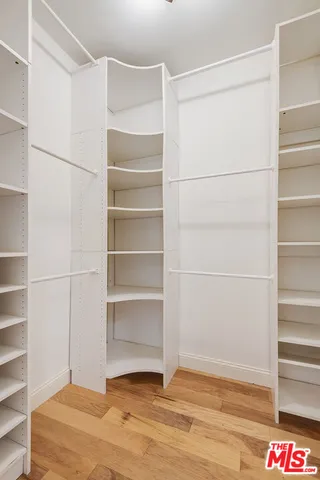 a view of an empty room with empty racks
