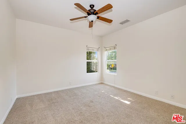 a bathroom with a sink a toilet and bathtub