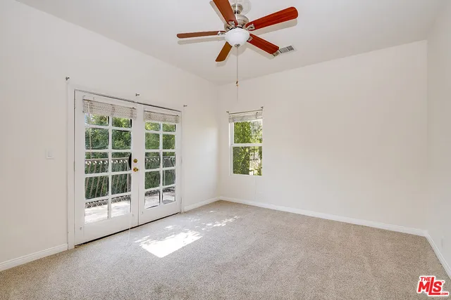 a view of a street from a balcony