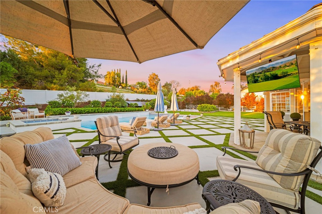 30702 Cll Pina Colada Temecula, CA 92591 - Photo 13 of 75 a view of a patio with couches chairs and a table