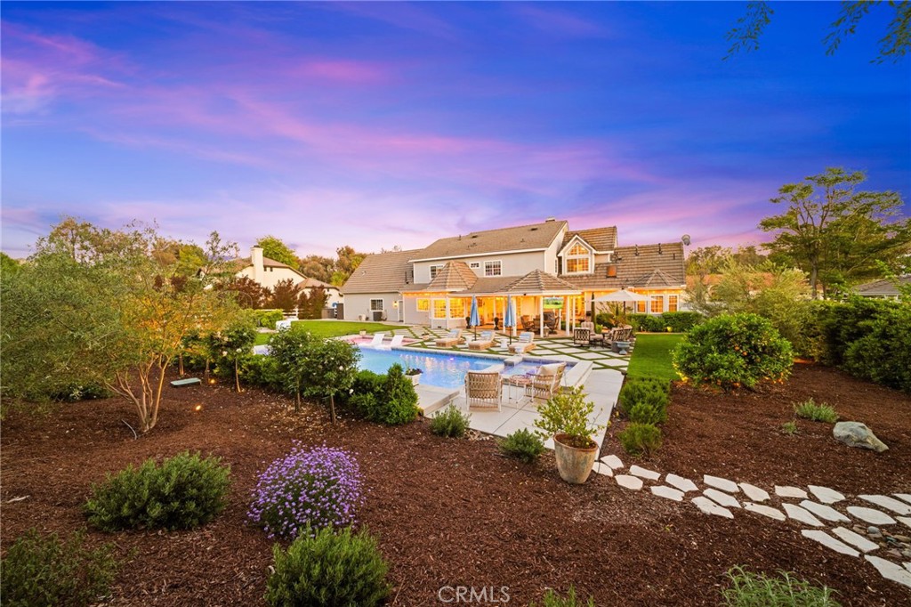 30702 Cll Pina Colada Temecula, CA 92591 - Photo 20 of 75 a view of a lake with a building in the background