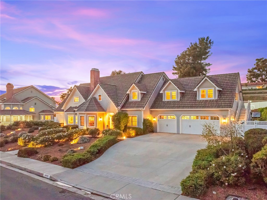 30702 Cll Pina Colada Temecula, CA 92591 - Photo 2 of 75 a view of a large house with a big yard and large trees