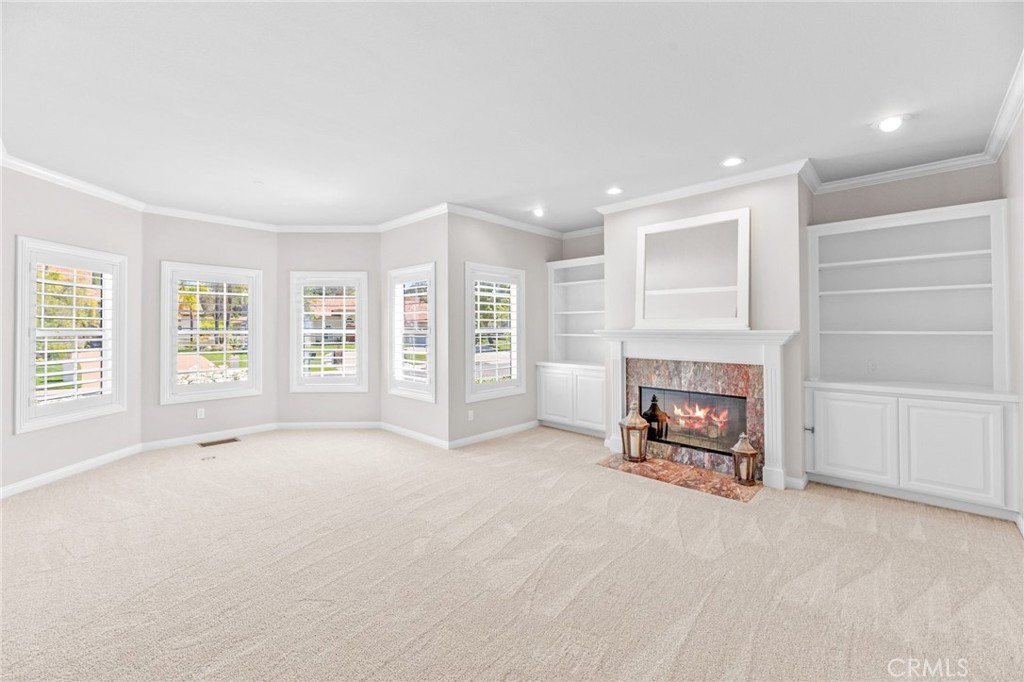 30702 Cll Pina Colada Temecula, CA 92591 - Photo 27 of 75 a view of a livingroom with a fireplace and window
