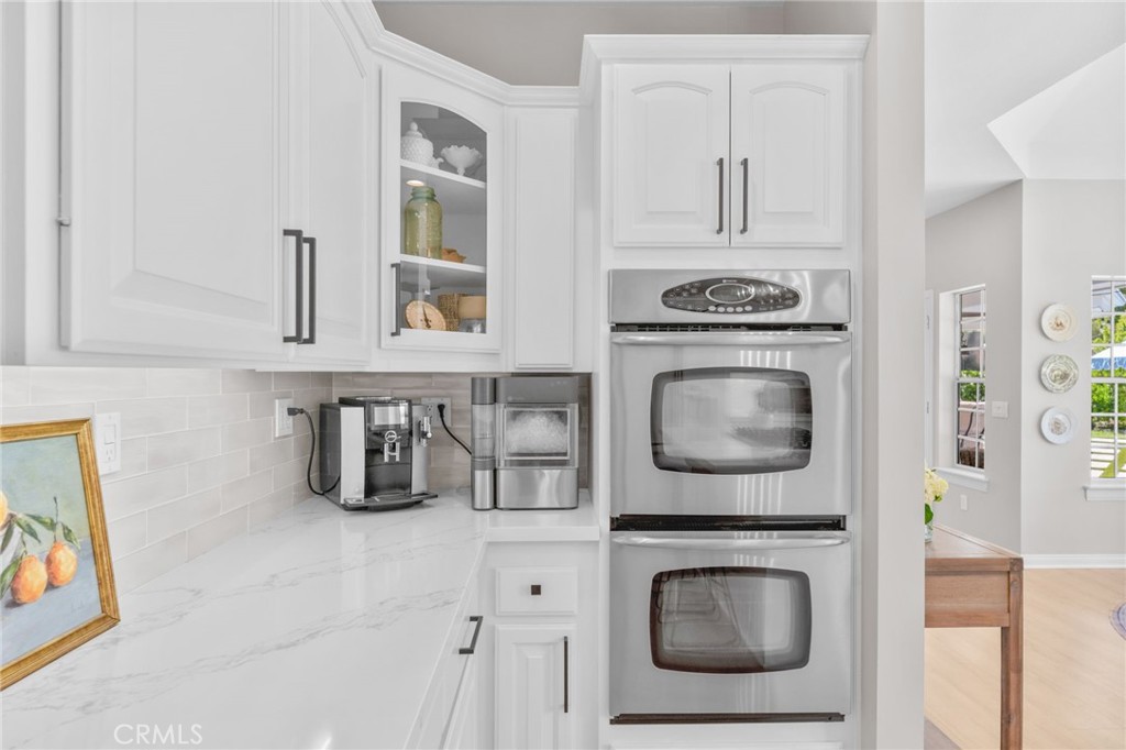 30702 Cll Pina Colada Temecula, CA 92591 - Photo 39 of 75 a utility room with dryer and washer