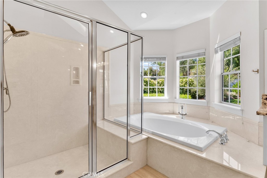 30702 Cll Pina Colada Temecula, CA 92591 - Photo 51 of 75 a bathroom with a tub shower and sink