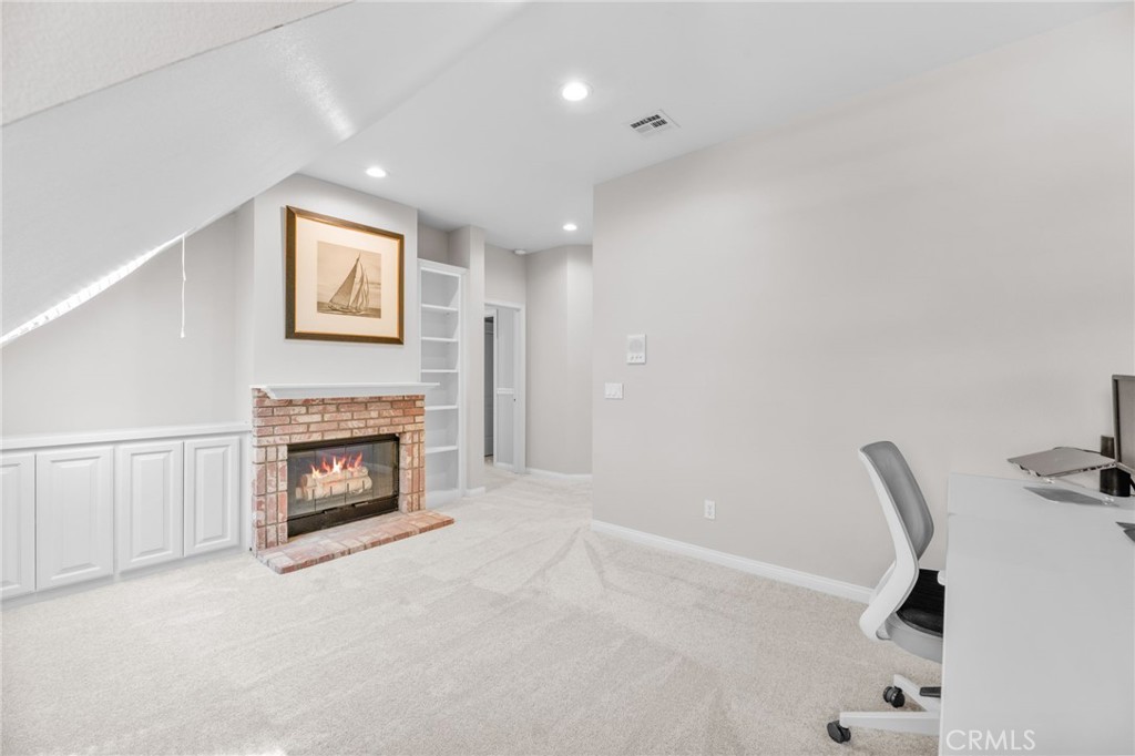 30702 Cll Pina Colada Temecula, CA 92591 - Photo 55 of 75 a view of a livingroom with a fireplace