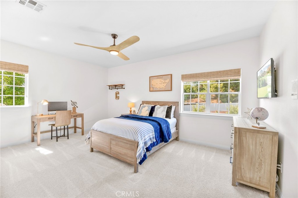 30702 Cll Pina Colada Temecula, CA 92591 - Photo 60 of 75 a spacious bedroom with a bed and a window