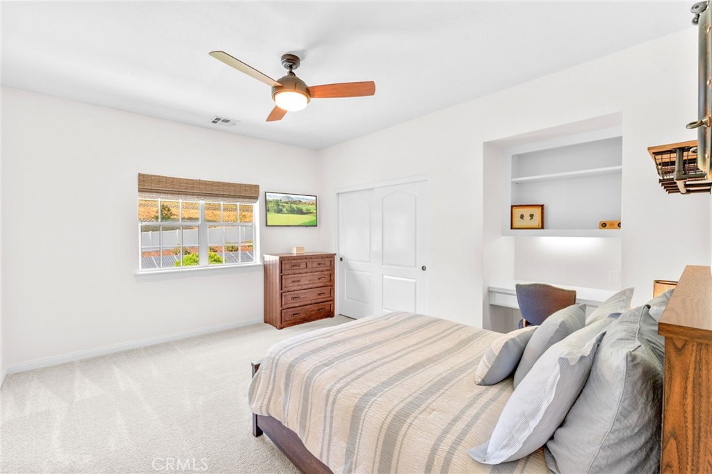 30702 Cll Pina Colada Temecula, CA 92591 - Photo 62 of 75 a bedroom with a bed and a window