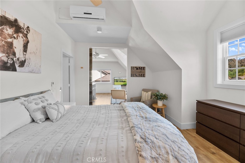 30702 Cll Pina Colada Temecula, CA 92591 - Photo 64 of 75 a bed room with a bed and a large mirror