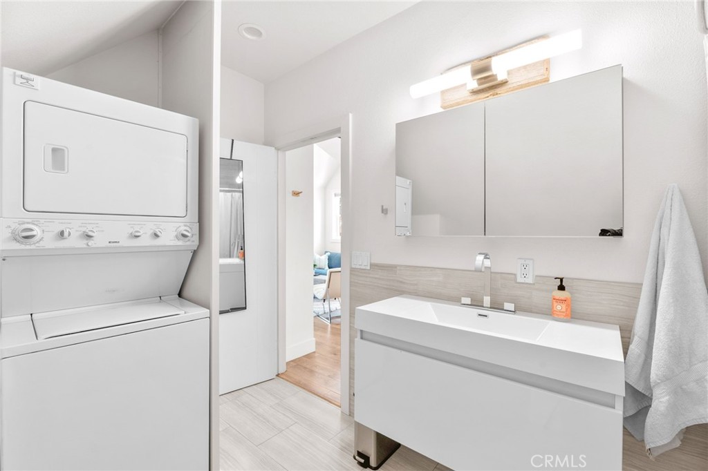 30702 Cll Pina Colada Temecula, CA 92591 - Photo 67 of 75 a bathroom with a sink a toilet and a mirror