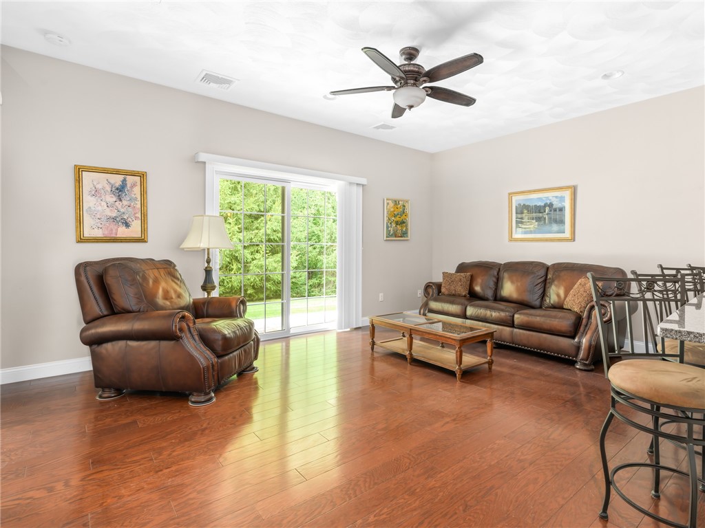 41 Breakneck Hill Road, Unit 42 Lincoln, RI 02865 - Photo 8 of 20 Living room with sliding glass door to private porch
