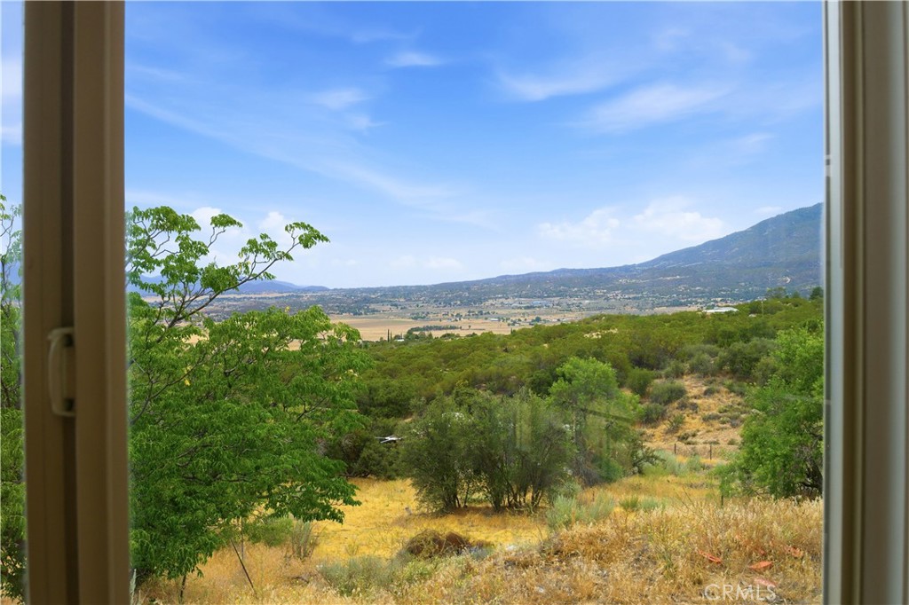 59995 Granite Gulley Road Anza, CA 92539 - Photo 32 of 33 a view of a lake with a mountain