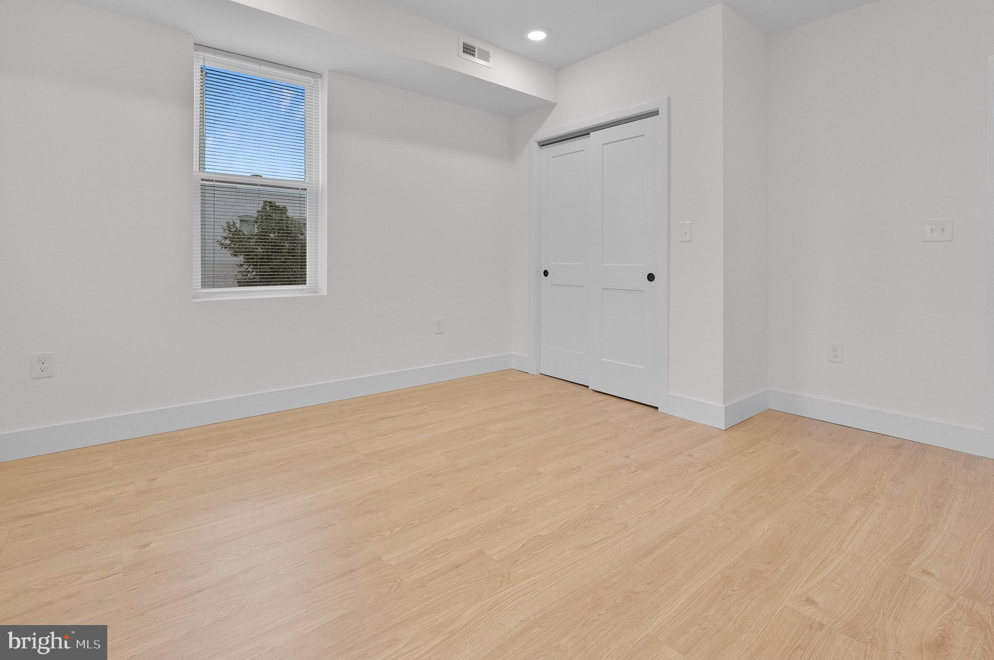 2200 East Fayette Street Baltimore, MD 21231 - Photo 11 of 23 a view of an empty room with a window