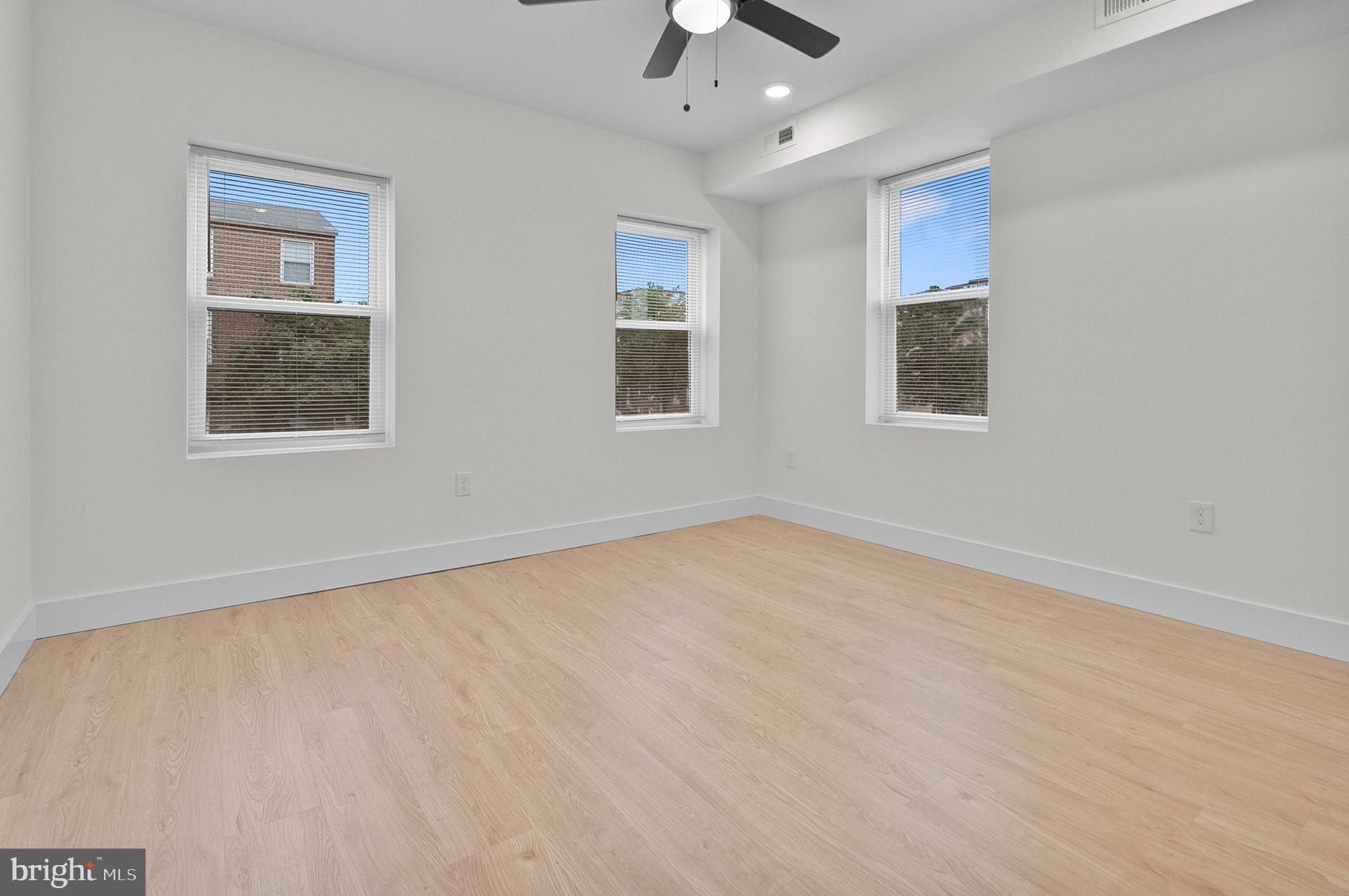 2200 East Fayette Street Baltimore, MD 21231 - Photo 8 of 23 a view of an empty room with a window