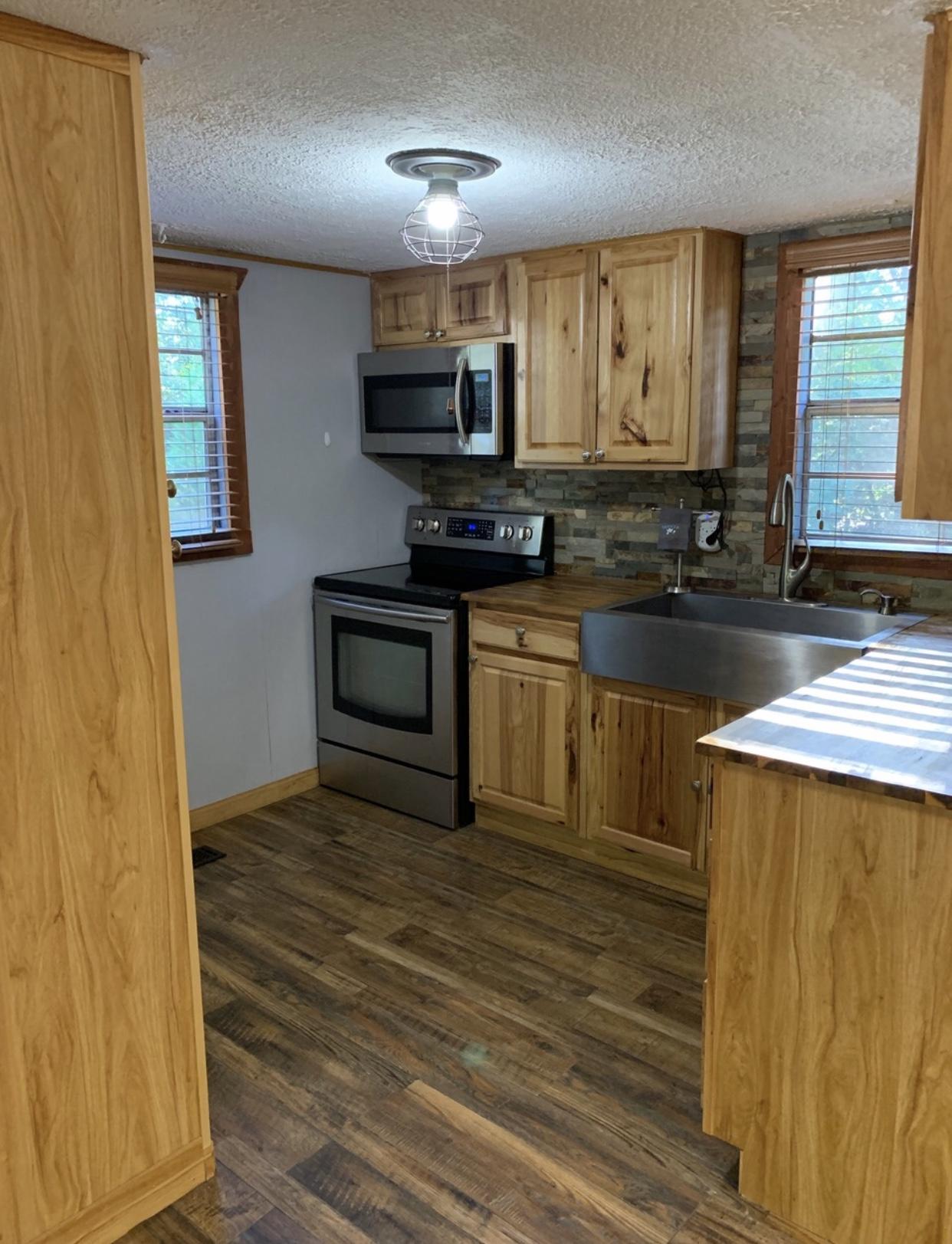 4701 Cate Road Strawberry Plains, TN 37871 - Photo 4 of 26 FE62B69E-C0D6-462E-9141-247E2B6DBF92