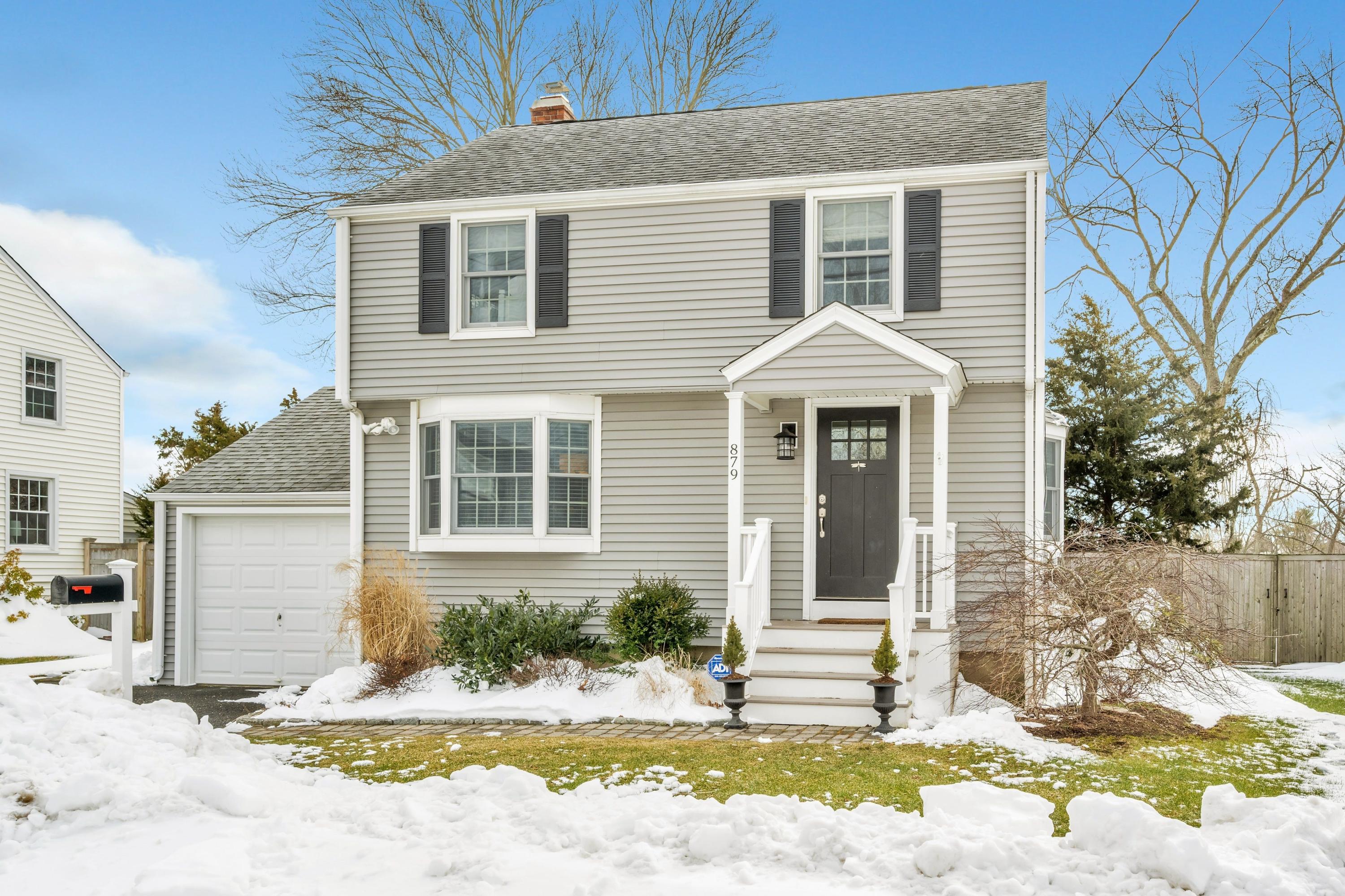 879 Oldfield Road Fairfield, CT 06824 - Photo 2 of 26 a front view of a house