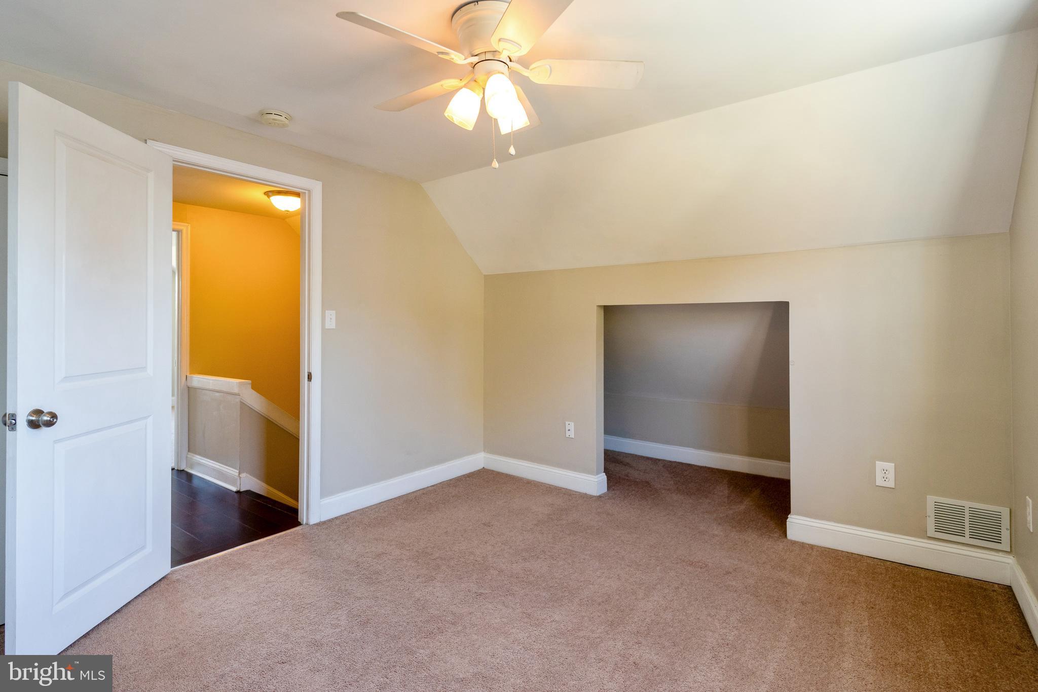 2810 Manoff Road Halethorpe, MD 21227 - Photo 19 of 27 a view of an empty room with window and closet area