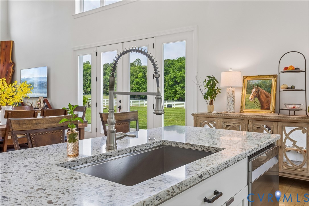 2016 Forge Road Toano, VA 23168 - Photo 56 of 99 Kitchen island featuring a stainless steel undermo