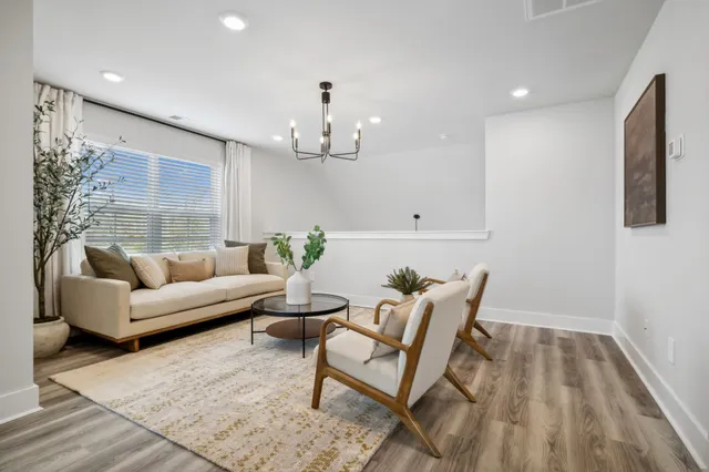 a bathroom with a toilet a sink and a mirror