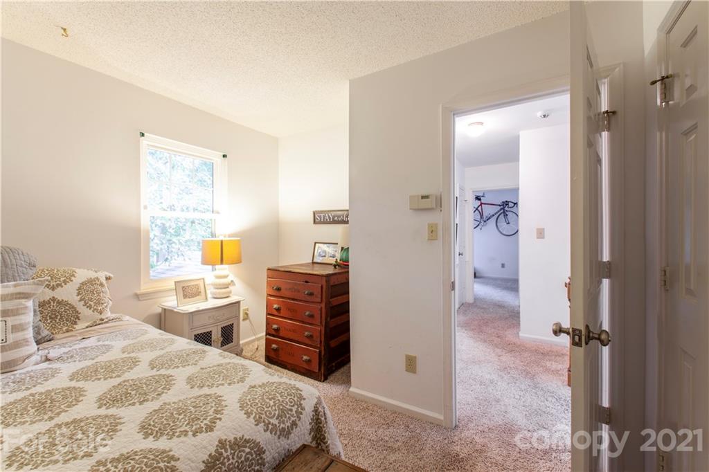 2512 Olde Whitehall Road Charlotte, NC 28273 - Photo 15 of 25 a bedroom with a bed and a dresser