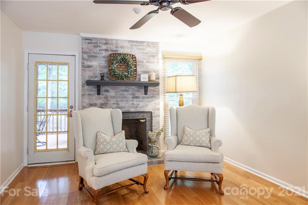 2512 Olde Whitehall Road Charlotte, NC 28273 - Photo 4 of 25 a living room with furniture and a fireplace
