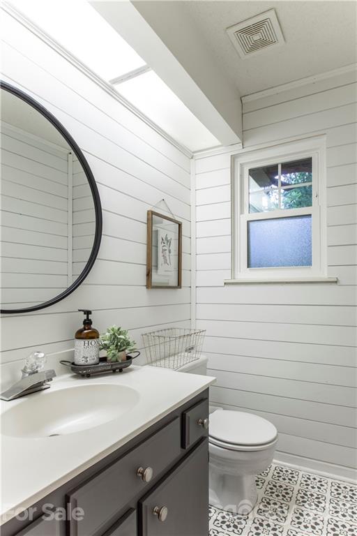 2512 Olde Whitehall Road Charlotte, NC 28273 - Photo 8 of 25 a bathroom with a sink a toilet and mirror