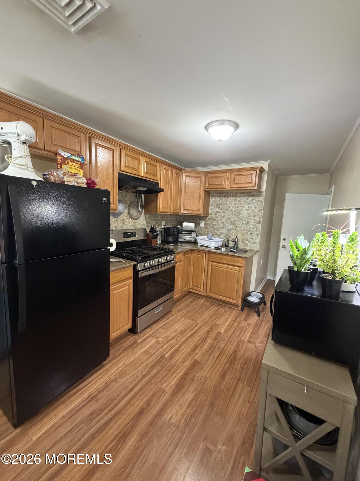 28 New Monmouth Road, Unit 2 Middletown, NJ 07748 - Photo 5 of 18 IMG_2349