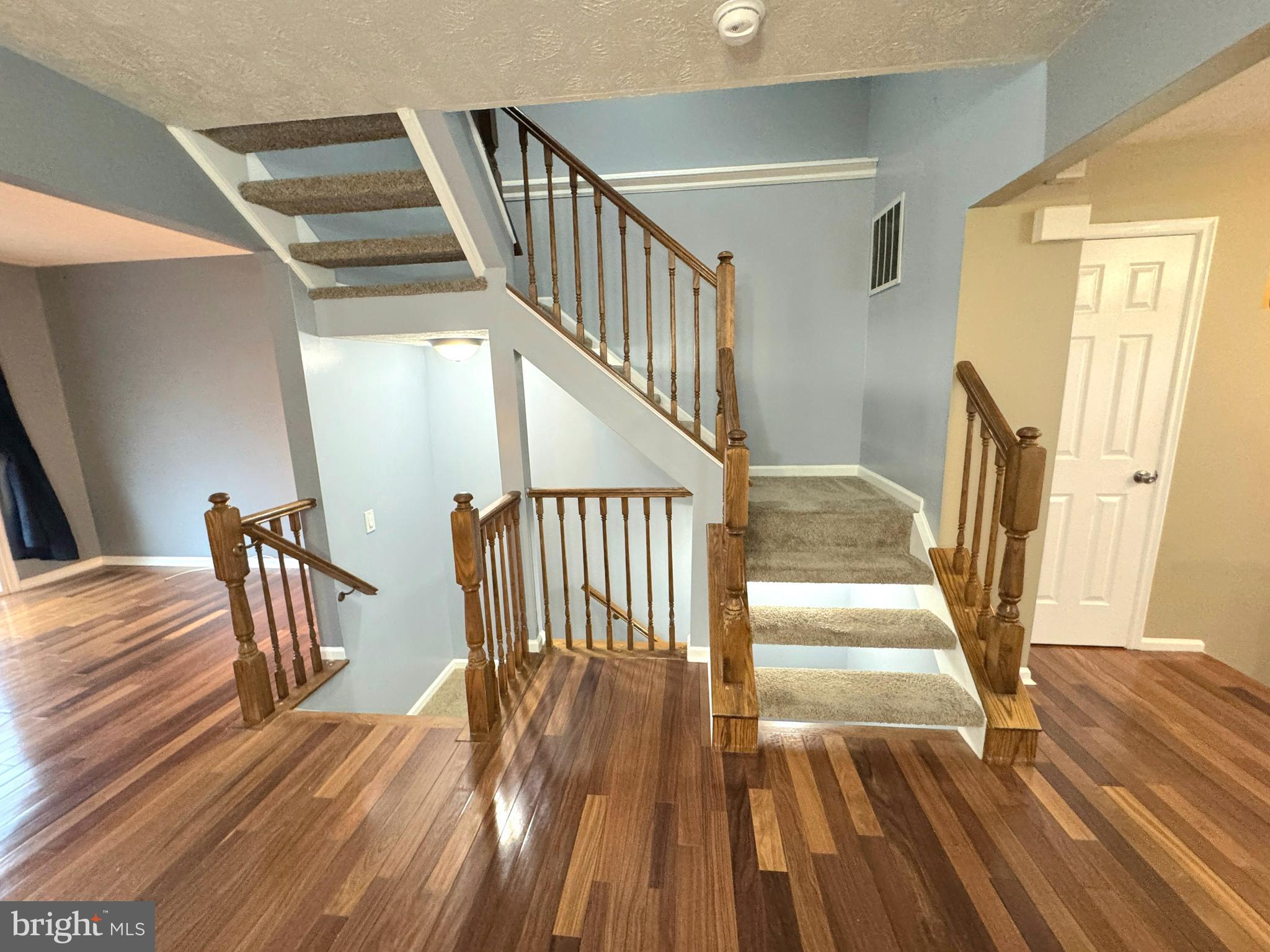 2108 Commodore Court Odenton, MD 21113 - Photo 13 of 38 a view of entryway and hall with wooden floor
