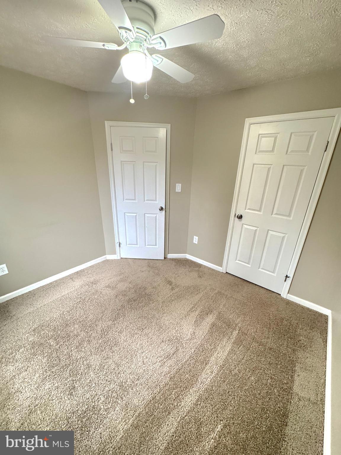 2108 Commodore Court Odenton, MD 21113 - Photo 17 of 38 an empty room with fan and entrance