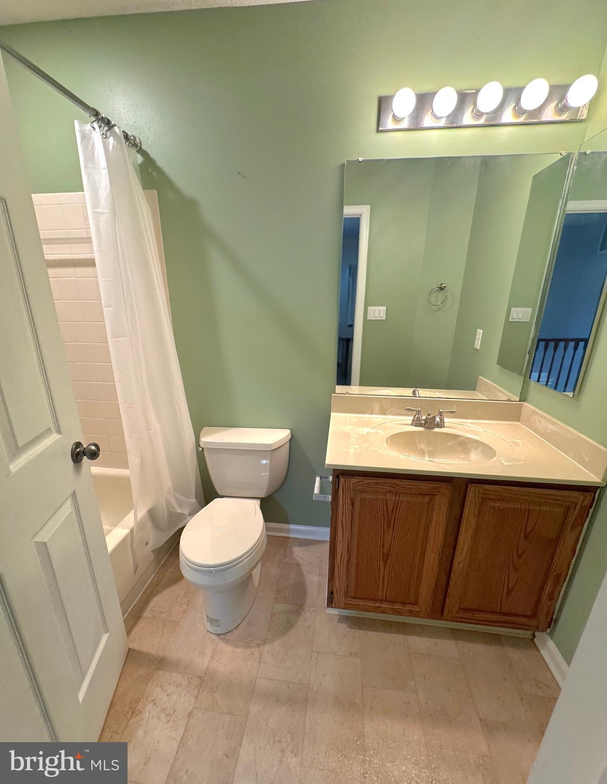 2108 Commodore Court Odenton, MD 21113 - Photo 20 of 38 a bathroom with a sink toilet and mirror