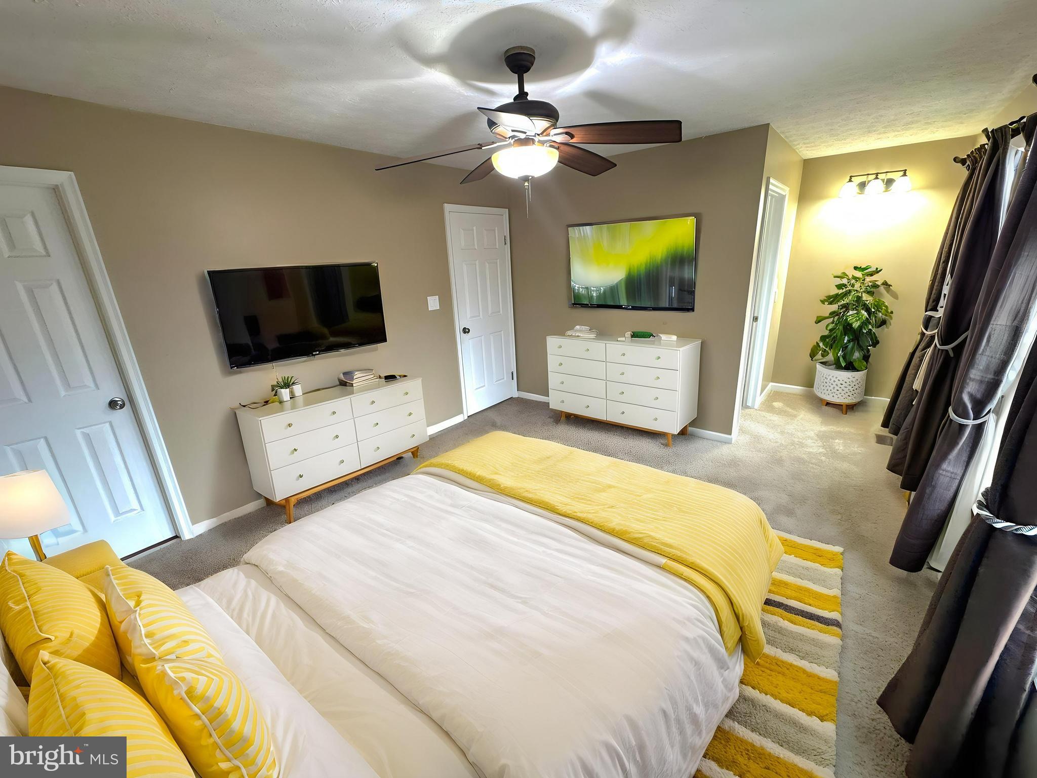 2108 Commodore Court Odenton, MD 21113 - Photo 22 of 38 a bedroom with a bed and a flat screen tv