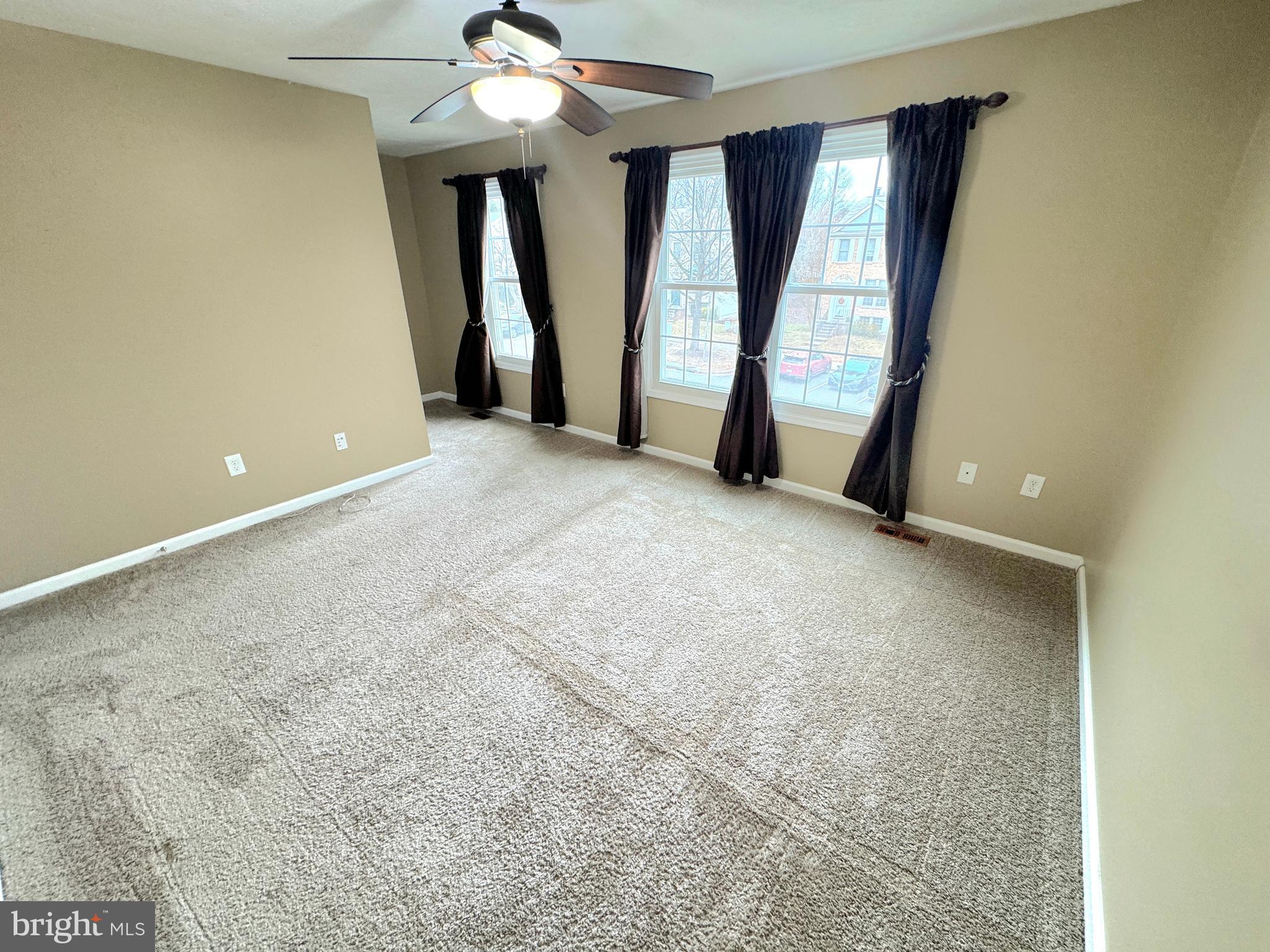 2108 Commodore Court Odenton, MD 21113 - Photo 23 of 38 an empty room with windows and closet