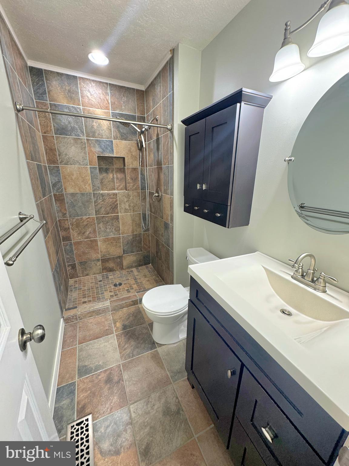 2108 Commodore Court Odenton, MD 21113 - Photo 24 of 38 a bathroom with a sink toilet and shower